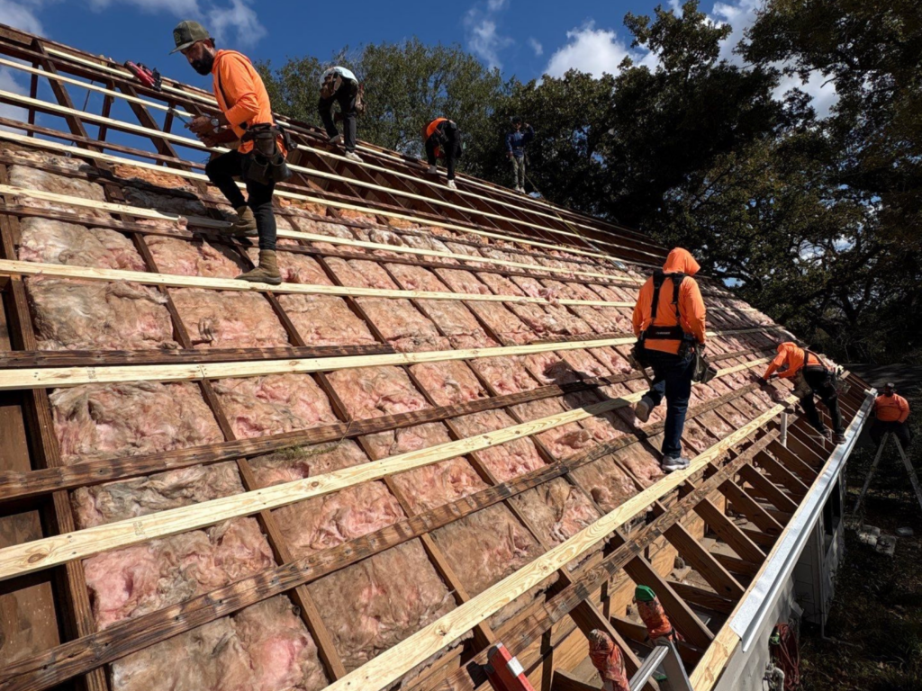 Replacing rotten decking, insulation, and rafters